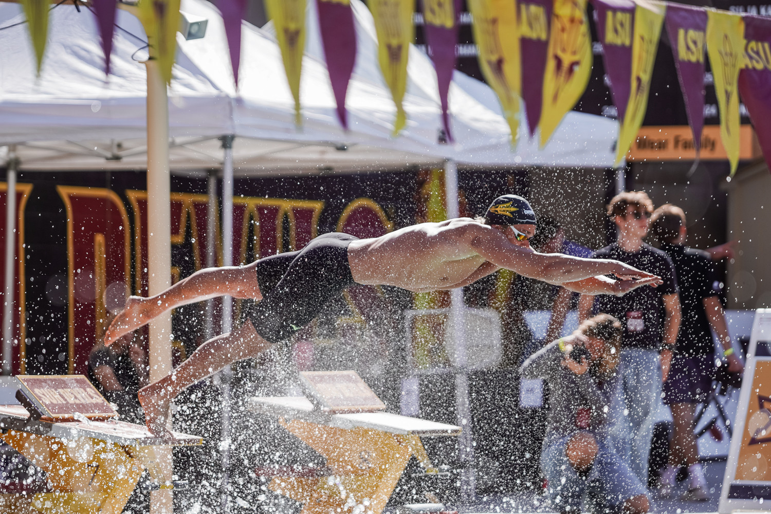 #3/18 Swim and Dive sets four pool records to split dual meet against ...